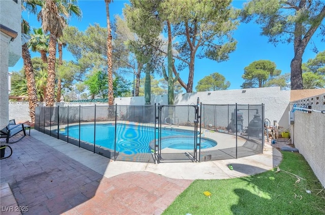 8404 Shore Breeze Dr, Las Vegas, NV 89128 - view of pool featuring a patio area, an in ground hot tub, a fenced in pool, and a fenced backyard