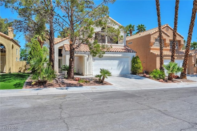 8404 Shore Breeze Dr, Las Vegas, NV 89128 - mediterranean / spanish-style house with a tile roof, driveway, a garage, and stucco siding