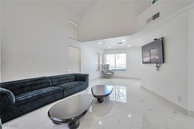 8404 Shore Breeze Dr, Las Vegas, NV 89128 - living area with marble finish floors, baseboards, a high ceiling, and recessed lighting