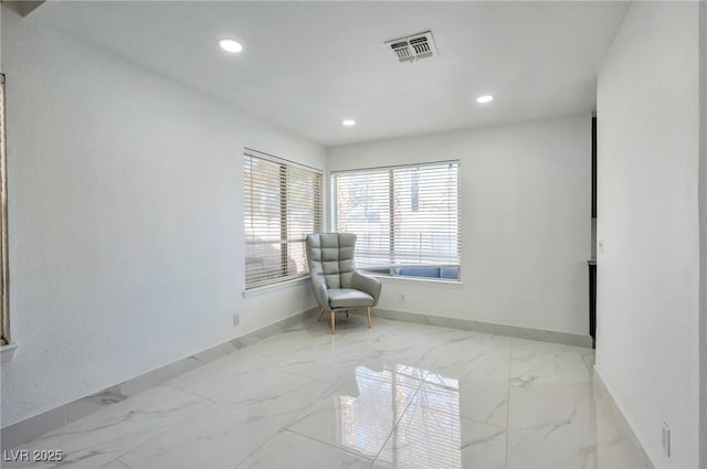 8404 Shore Breeze Dr, Las Vegas, NV 89128 - living area with baseboards, recessed lighting, marble finish floor, and visible vents