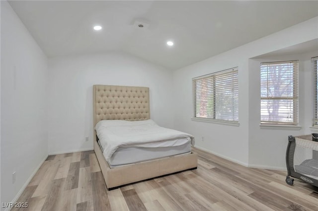 8404 Shore Breeze Dr, Las Vegas, NV 89128 - bedroom with lofted ceiling, baseboards, recessed lighting, and wood finished floors
