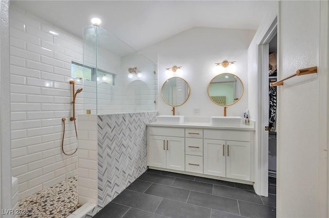 8404 Shore Breeze Dr, Las Vegas, NV 89128 - bathroom featuring walk in shower, double vanity, tile patterned floors, and a sink