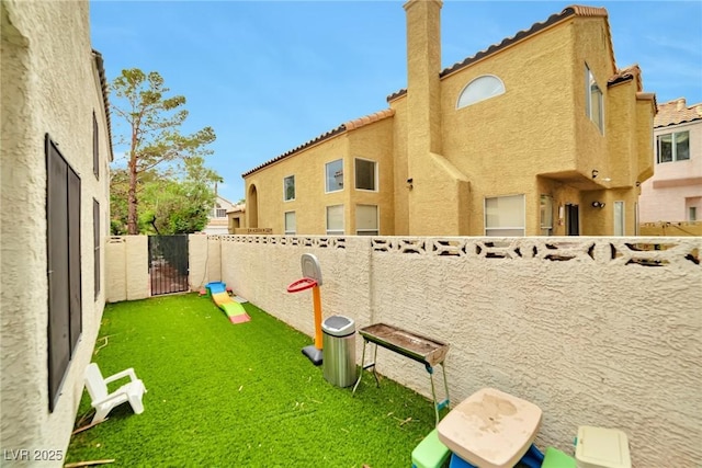 8404 Shore Breeze Dr, Las Vegas, NV 89128 - view of yard with fence and a gate