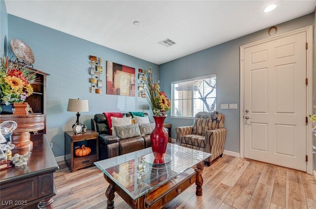7651 Anatolian St, Las Vegas, NV 89166 - living area featuring light wood-type flooring, recessed lighting, baseboards, and visible vents