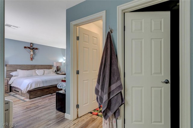 7651 Anatolian St, Las Vegas, NV 89166 - bedroom with light wood-style floors, baseboards, and visible vents