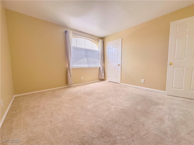 7840 Millhopper Ave, Las Vegas, NV 89128 - unfurnished room featuring carpet floors and baseboards