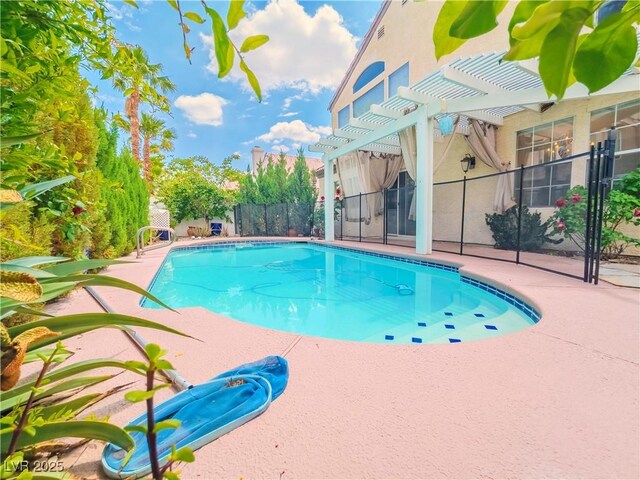 7840 Millhopper Ave, Las Vegas, NV 89128 - view of swimming pool featuring a pergola, fence, and a patio