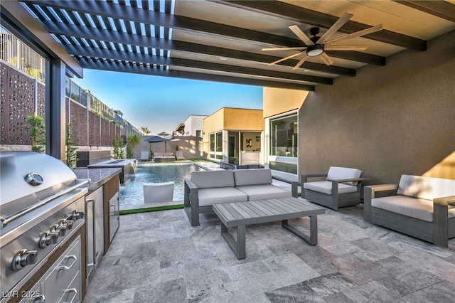 819 Bolide St, Las Vegas, NV 89138 - view of patio featuring exterior kitchen, area for grilling, an outdoor hangout area, and a fenced backyard