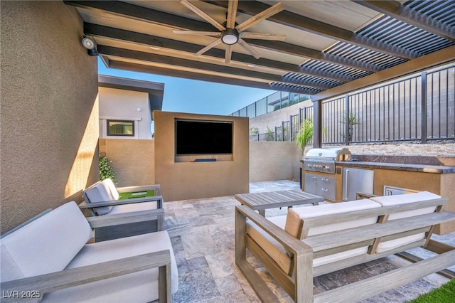 819 Bolide St, Las Vegas, NV 89138 - view of patio / terrace with a grill, a ceiling fan, an outdoor kitchen, a pergola, and fence