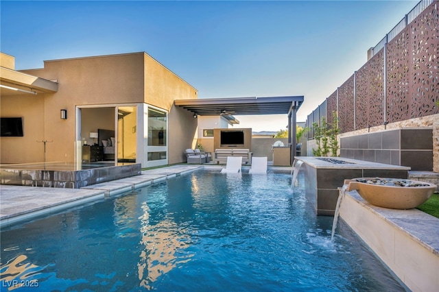 819 Bolide St, Las Vegas, NV 89138 - view of swimming pool with an outdoor kitchen and a patio
