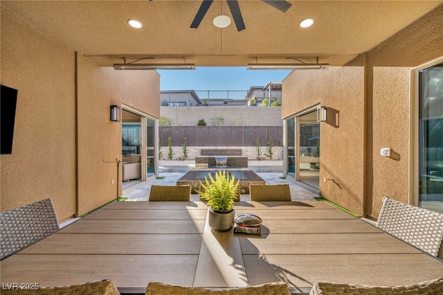 819 Bolide St, Las Vegas, NV 89138 - view of patio featuring a ceiling fan and fence