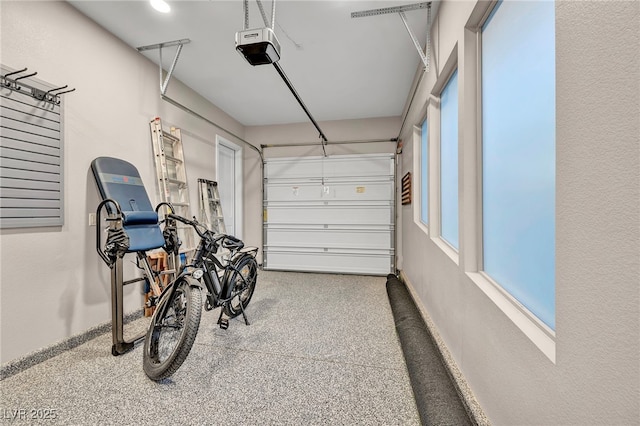 819 Bolide St, Las Vegas, NV 89138 - garage with a garage door opener and baseboards