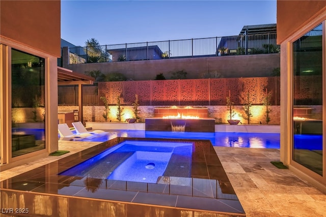 819 Bolide St, Las Vegas, NV 89138 - view of swimming pool featuring an in-ground hot tub, fence, and a patio area