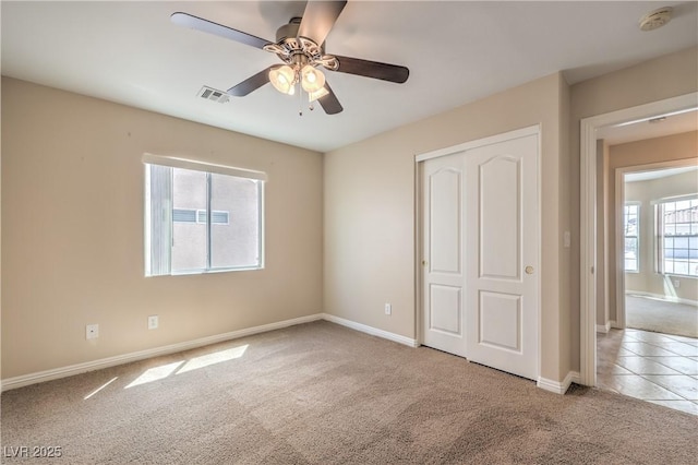 8664 Frasure Falls Ave, Las Vegas, NV 89178 - unfurnished bedroom with a closet, visible vents, carpet floors, a ceiling fan, and baseboards