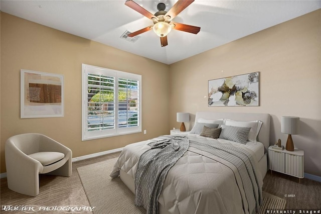 bedroom with carpet, baseboards, a ceiling fan, and visible vents