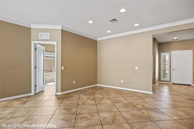 empty room featuring recessed lighting, baseboards, visible vents, light tile patterned flooring, and crown molding