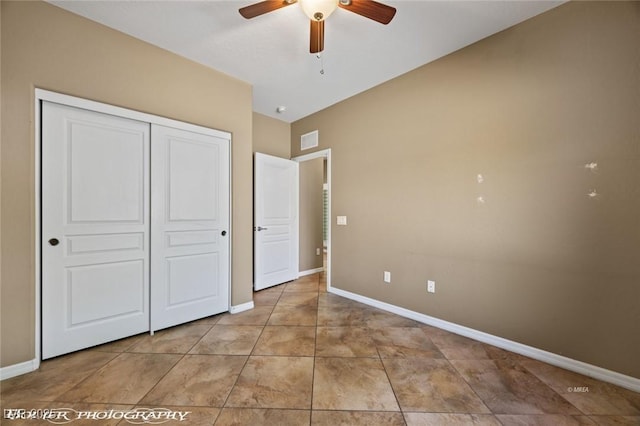 unfurnished bedroom with baseboards, tile patterned flooring, a closet, and visible vents