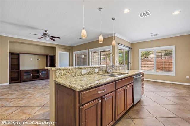 kitchen featuring stainless steel dishwasher, light tile patterned floors, visible vents, and a sink