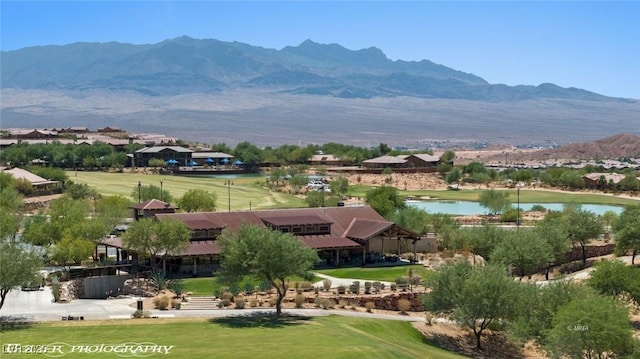 mountain view featuring a water view and golf course view