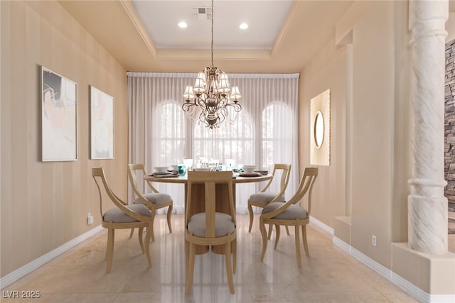 1008 Trophy Hills Dr, Las Vegas, NV 89134 - dining area with a tray ceiling, an inviting chandelier, baseboards, and visible vents