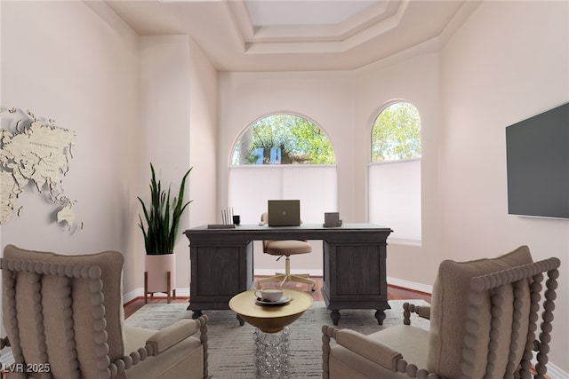 1008 Trophy Hills Dr, Las Vegas, NV 89134 - office area featuring baseboards, a tray ceiling, and wood finished floors
