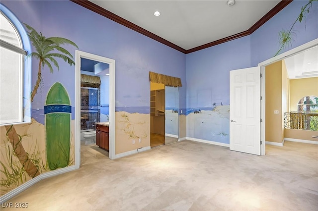 1008 Trophy Hills Dr, Las Vegas, NV 89134 - unfurnished bedroom with ensuite bath, ornamental molding, carpet floors, and baseboards