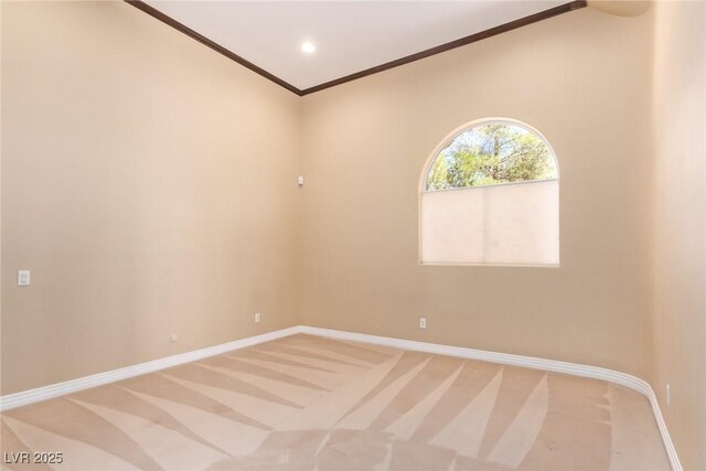 1008 Trophy Hills Dr, Las Vegas, NV 89134 - spare room featuring light colored carpet, crown molding, baseboards, and recessed lighting