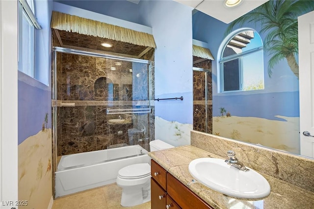 1008 Trophy Hills Dr, Las Vegas, NV 89134 - bathroom featuring vanity, toilet, tile patterned flooring, and enclosed tub / shower combo