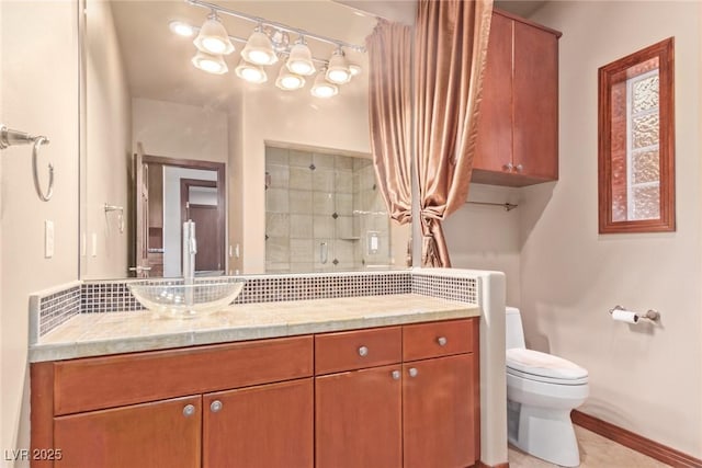 1008 Trophy Hills Dr, Las Vegas, NV 89134 - full bathroom featuring walk in shower, toilet, vanity, decorative backsplash, and baseboards