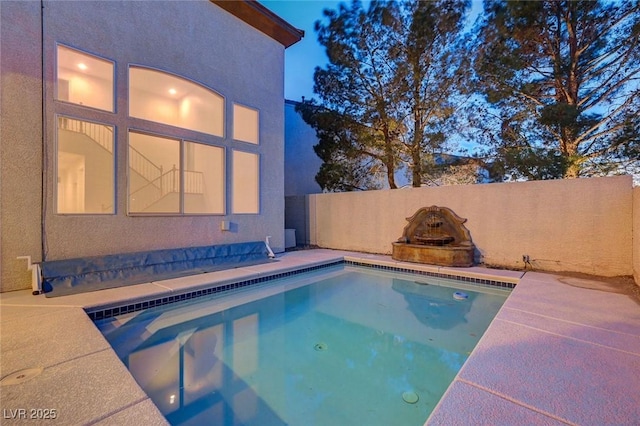 view of pool featuring a fenced in pool and a fenced backyard