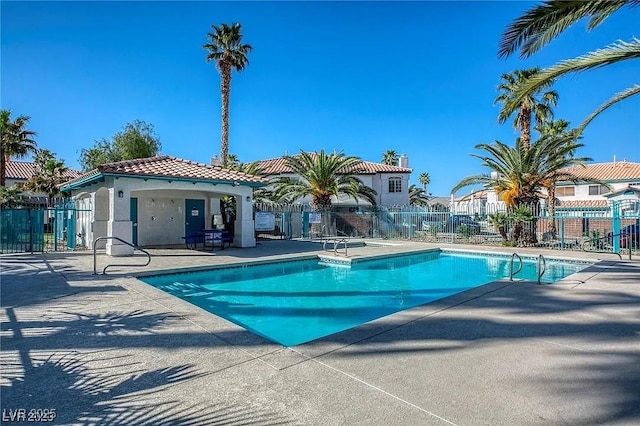 5024 Starfinder Ave, Las Vegas, NV 89108 - community pool with fence and a patio area