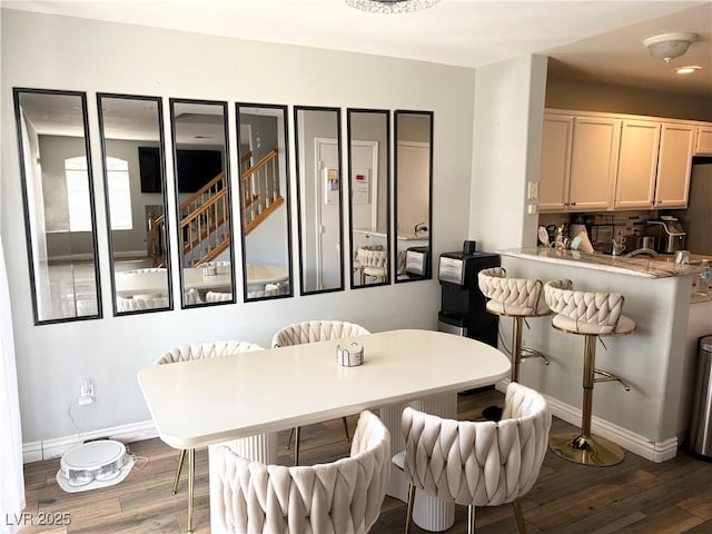 5024 Starfinder Ave, Las Vegas, NV 89108 - dining room featuring dark wood finished floors and baseboards