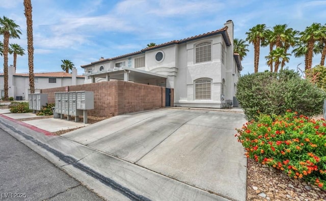 5024 Starfinder Ave, Las Vegas, NV 89108 - mediterranean / spanish-style house featuring stucco siding and a chimney