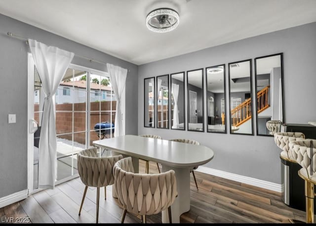 5024 Starfinder Ave, Las Vegas, NV 89108 - dining space with wood finished floors and baseboards