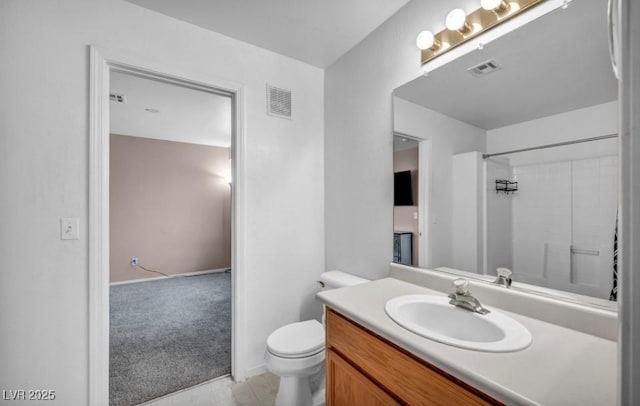 5024 Starfinder Ave, Las Vegas, NV 89108 - bathroom with vanity, toilet, and a shower