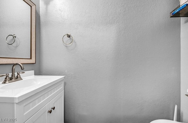 5024 Starfinder Ave, Las Vegas, NV 89108 - half bath featuring vanity and toilet