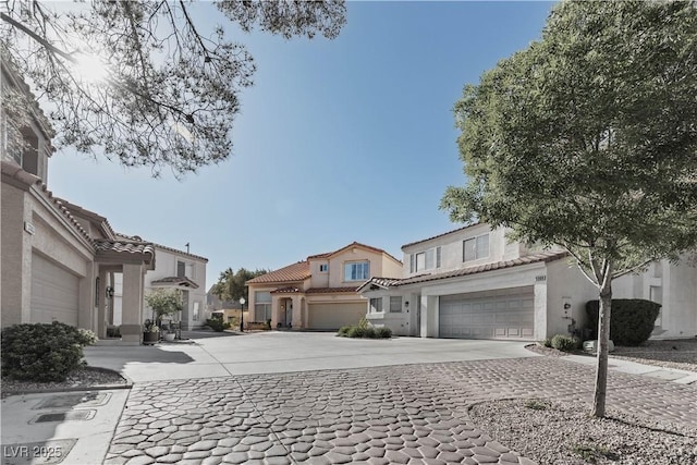 view of street with decorative driveway and a residential view