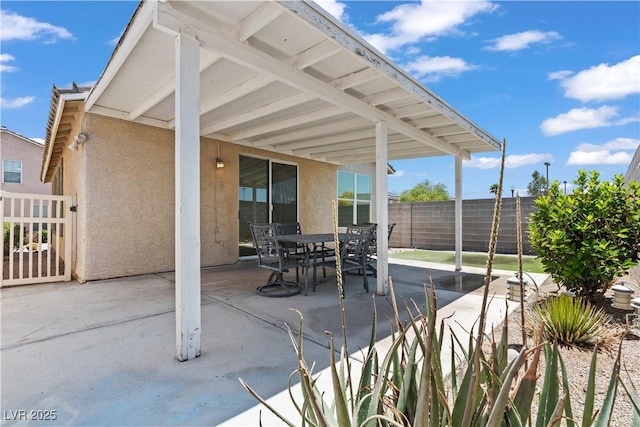 view of patio / terrace with fence and outdoor dining space