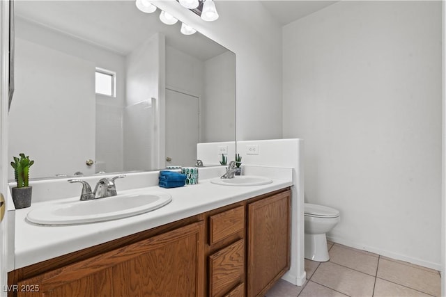 full bathroom with tile patterned flooring, toilet, and double vanity