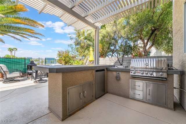 view of patio / terrace with a grill, a pergola, area for grilling, and fence