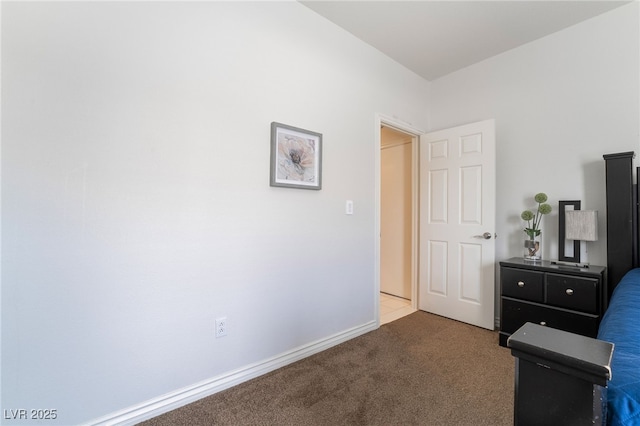 carpeted bedroom with baseboards