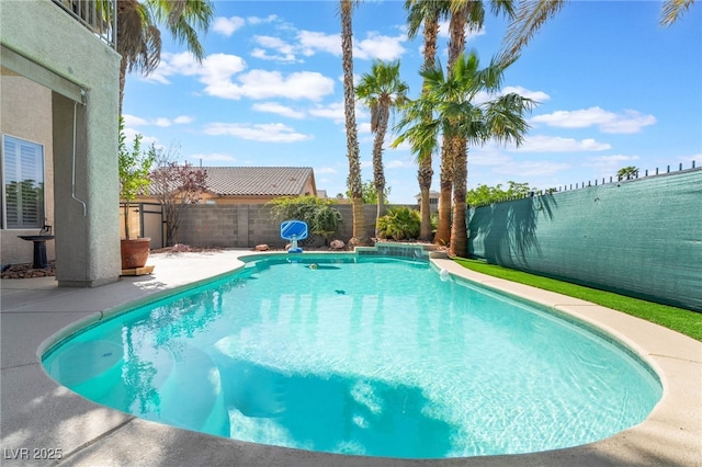 view of pool featuring a patio, a fenced in pool, and a fenced backyard