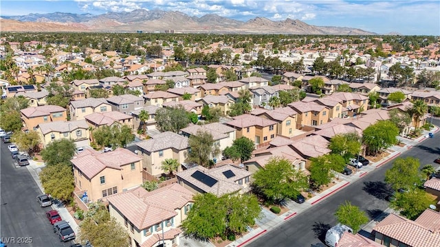 bird's eye view featuring a mountain view and a residential view