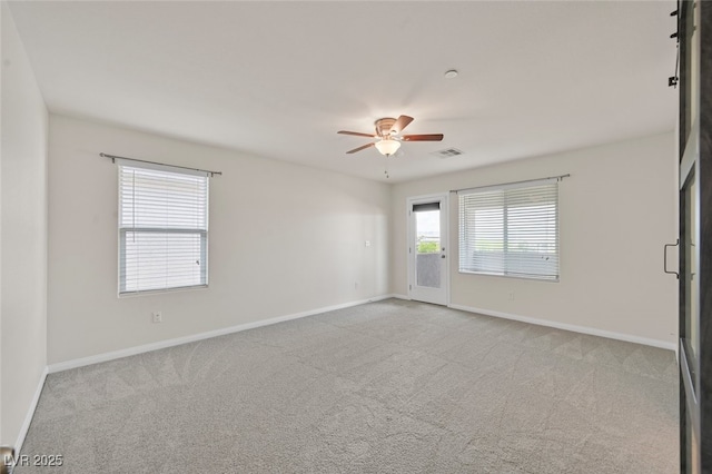 2486 Dragon Fire Ln, Henderson, NV 89052 - carpeted spare room featuring ceiling fan, baseboards, and visible vents