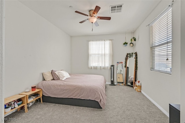 2486 Dragon Fire Ln, Henderson, NV 89052 - carpeted bedroom with ceiling fan, baseboards, and visible vents