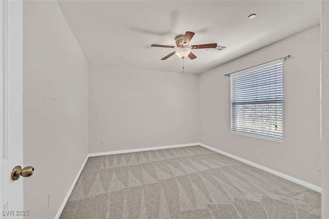 2486 Dragon Fire Ln, Henderson, NV 89052 - carpeted spare room with visible vents, baseboards, and ceiling fan