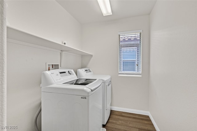 2486 Dragon Fire Ln, Henderson, NV 89052 - laundry room with laundry area, dark wood finished floors, baseboards, and washing machine and dryer