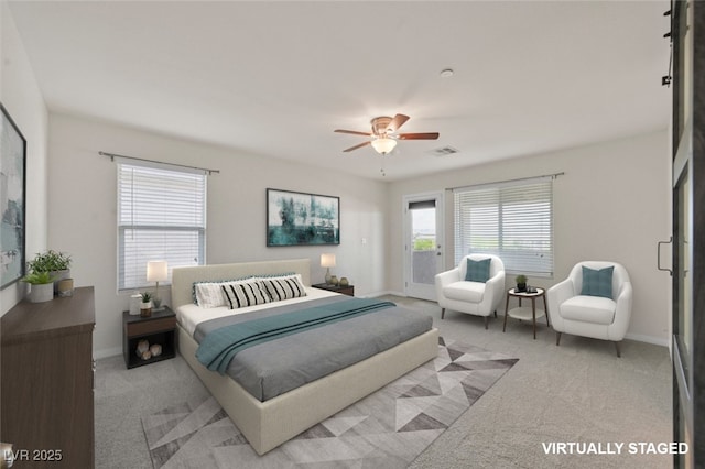 2486 Dragon Fire Ln, Henderson, NV 89052 - carpeted bedroom with baseboards, access to outside, and a ceiling fan