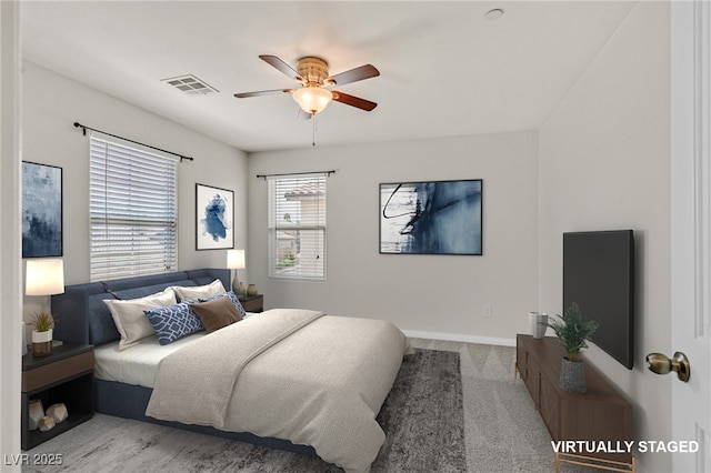 2486 Dragon Fire Ln, Henderson, NV 89052 - carpeted bedroom with baseboards and ceiling fan
