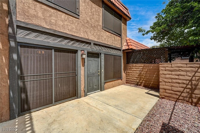 view of patio / terrace with fence